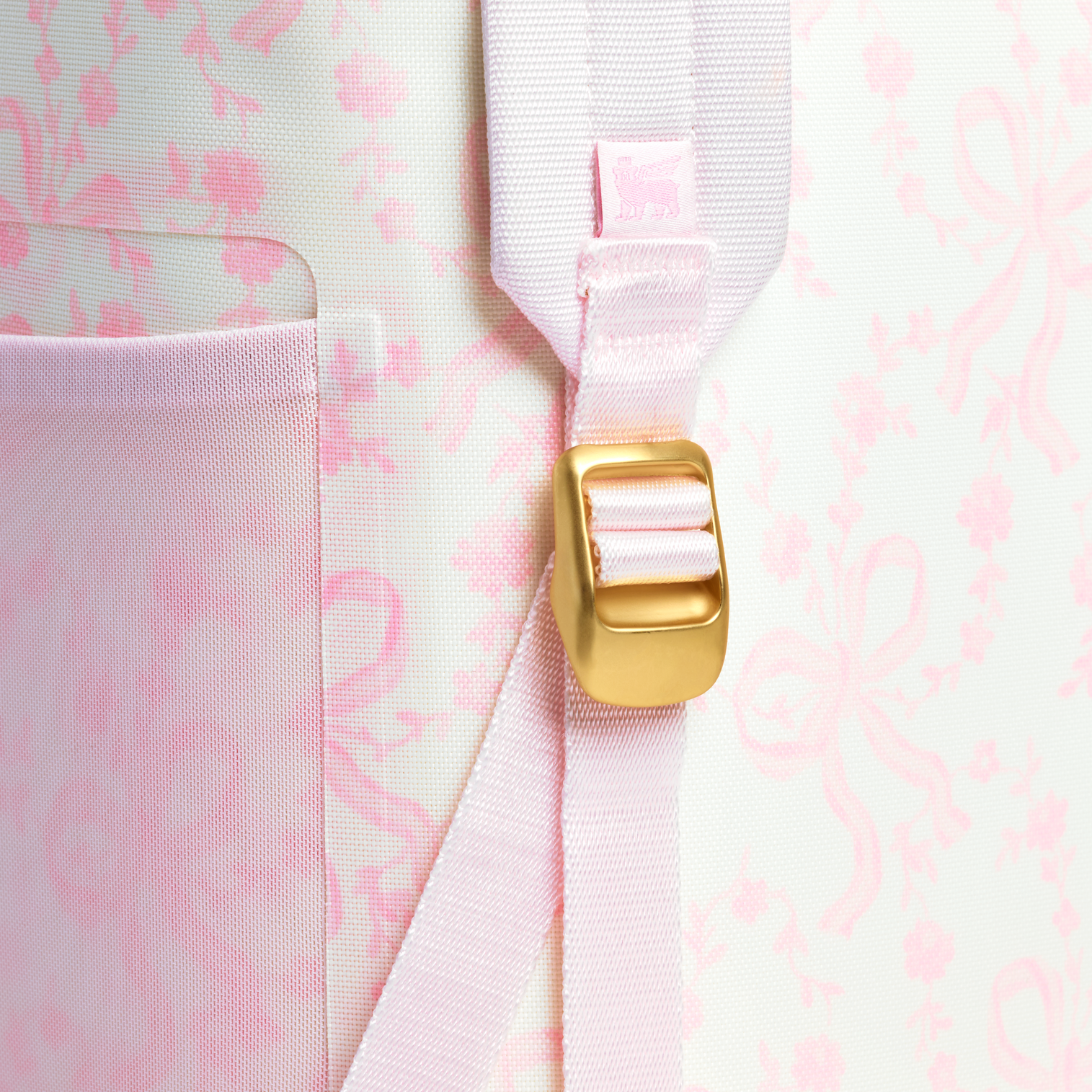 Web_PNG_Square-TheAll-DayMadeleineMiniCoolerBackpack14QT-CoquetteBowChantilly-Detail.png